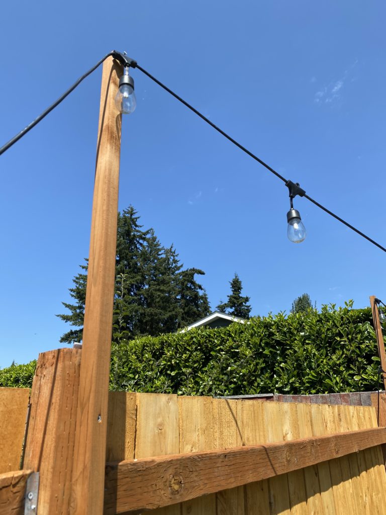 best way to hang string lights on fence